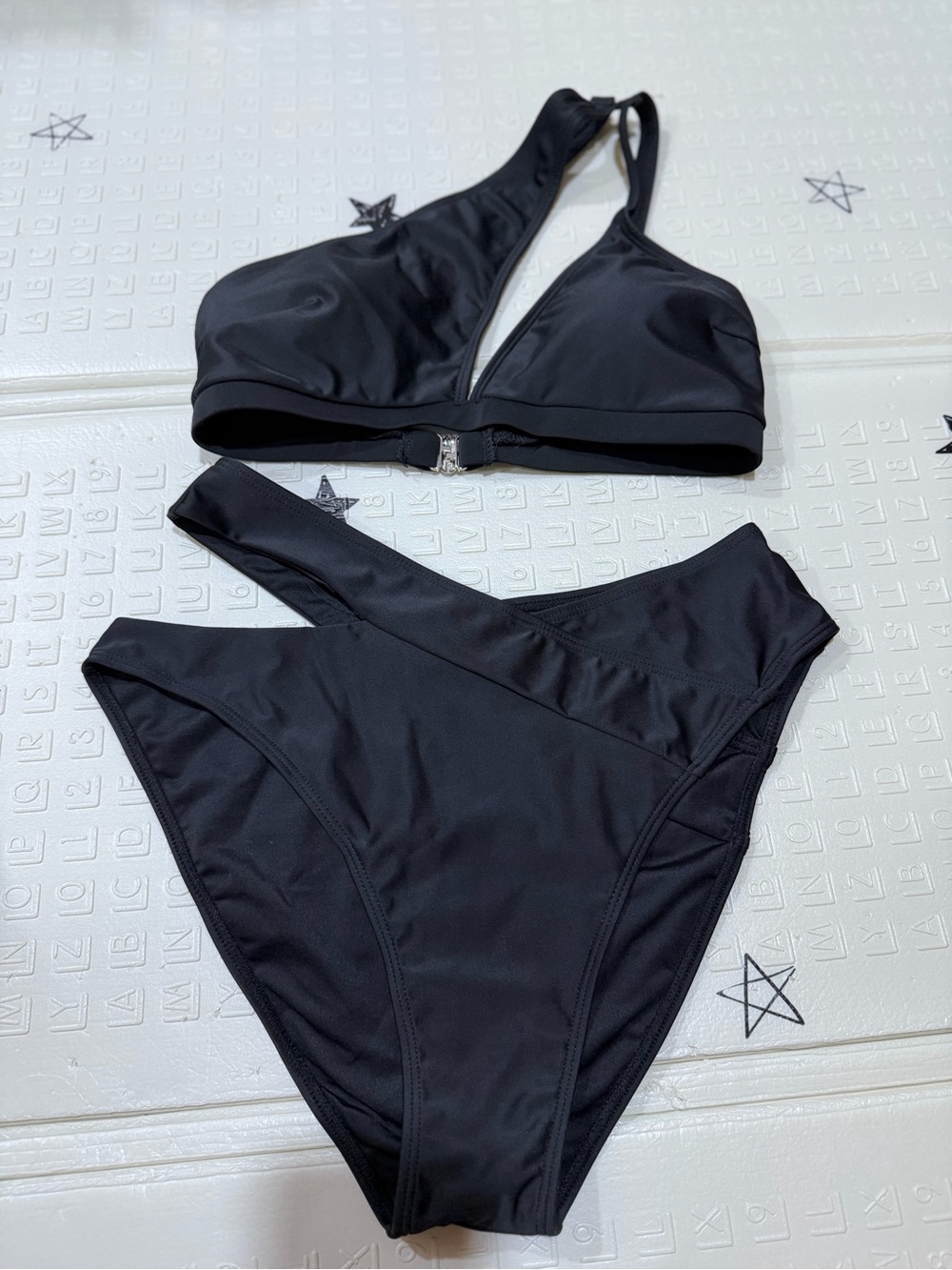 Womenโs Black Asymmetric Cut Bikini Set